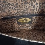 A unique, stylish clutch made from natural leather.